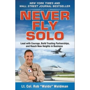 Never Fly Solo: Lead with Courage, Build Trusting Partnerships, and Reach New Heights in Business - Hardcover