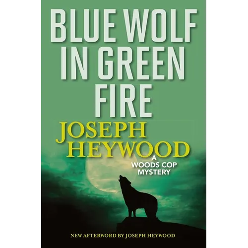 Blue Wolf In Green Fire: A Woods Cop Mystery - Paperback